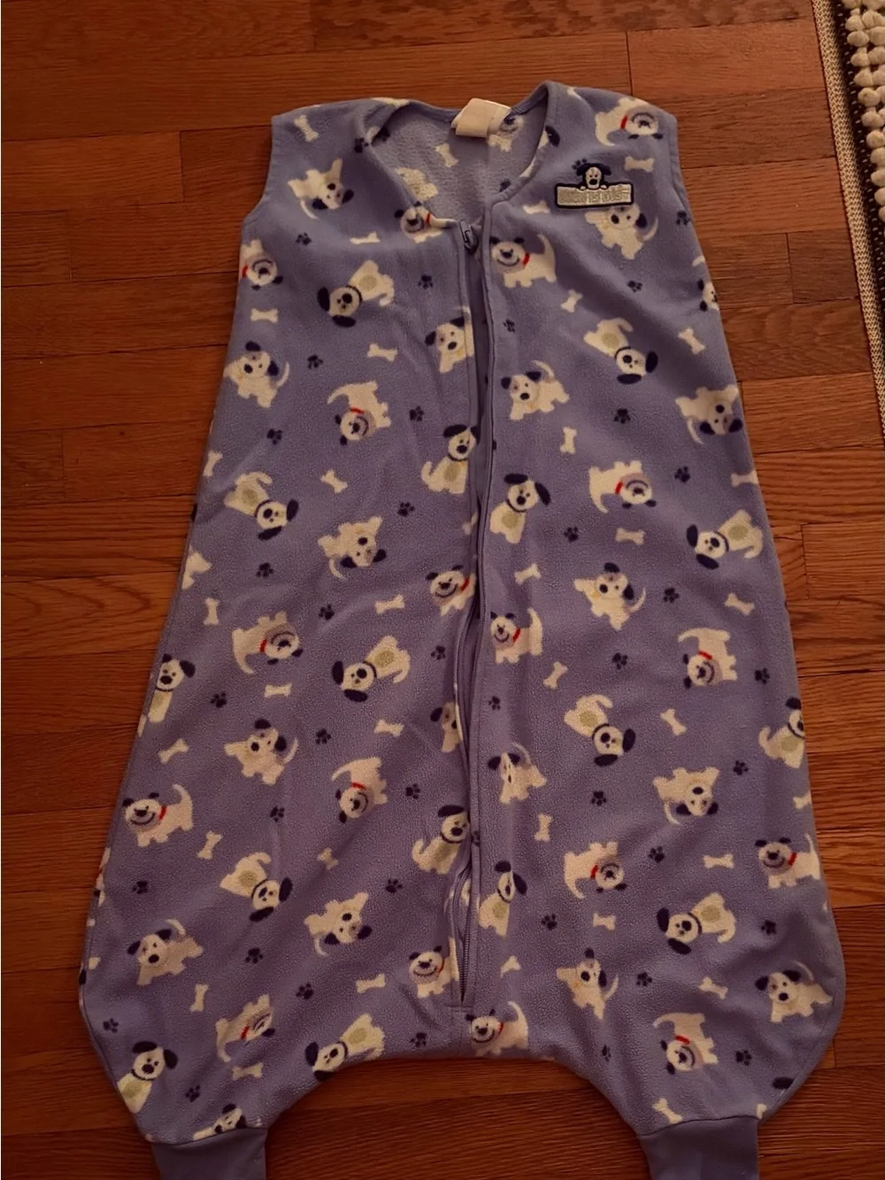HALO Early Walker SleepSack in a blue puppy/dog fleece pattern